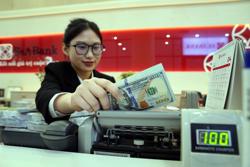 Giá USD ngân hàng và tự do cùng lao dốc